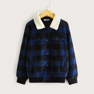 Brand new never worn blue and black jacket